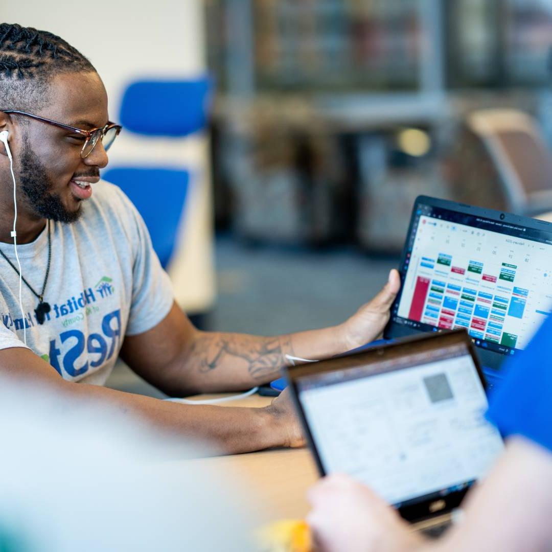 Student showing other students their Google Calendar schedule